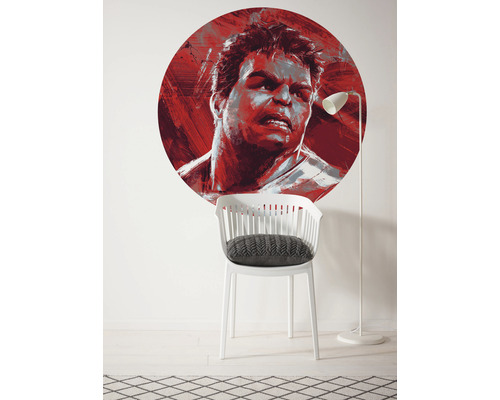 Sticker mural avec motif Hulk dans une pièce avec une chaise et une lampe