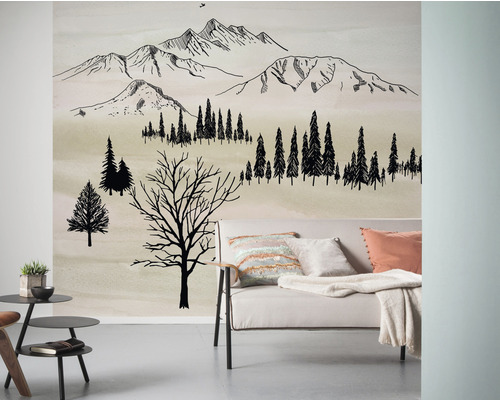 Salon avec papier peint mural représentant des montagnes et une forêt