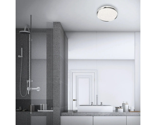 Modernes Badezimmer mit Dusche, Waschbecken und runder Deckenleuchte