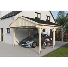 Abri de voiture en bois avec voiture et moto devant une maison