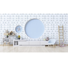 Kinderzimmer mit Elefantentapete, runder Wanddekoration und Möbeln