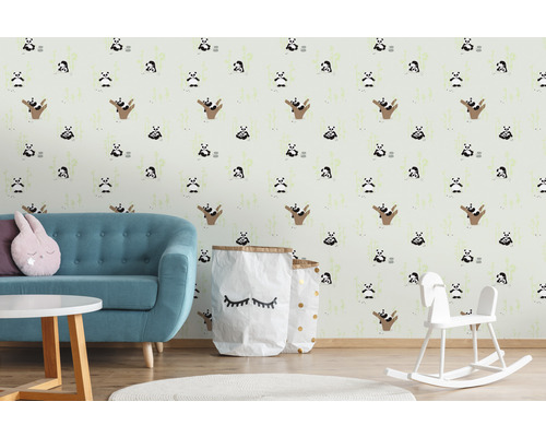 Salon avec canapé et papier peint à motif de panda