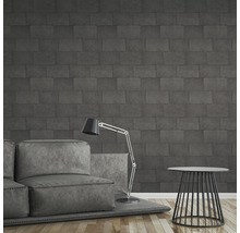 Wohnzimmer mit Sofa, Stehlampe und Wand in Ziegeloptik