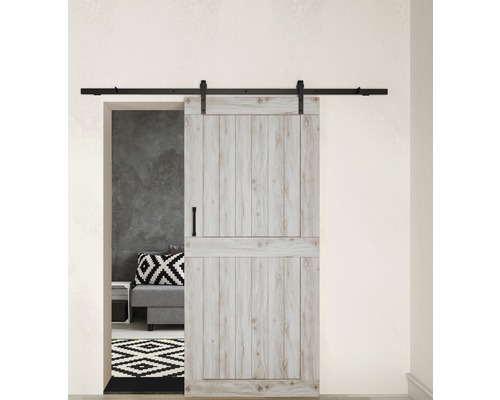 Porte coulissante avec ferrures devant une scène de salon