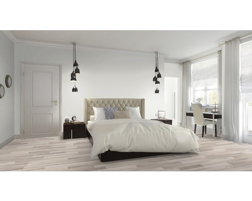 Chambre lumineuse avec lit double, tables de chevet, bureau et suspensions