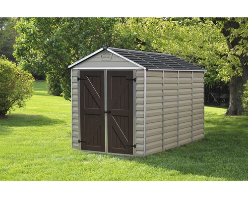 Abri de jardin en plastique avec double porte dans le jardin