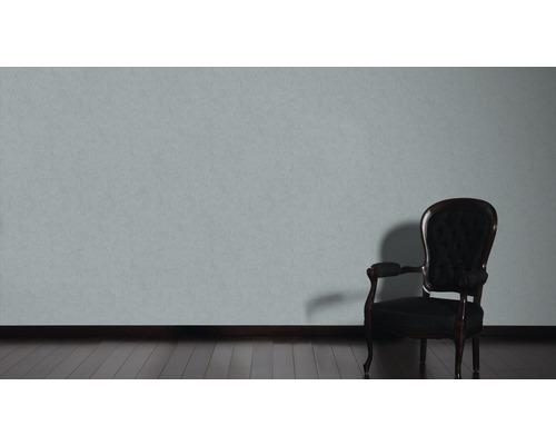 Szene mit einem Sessel und einer Wand