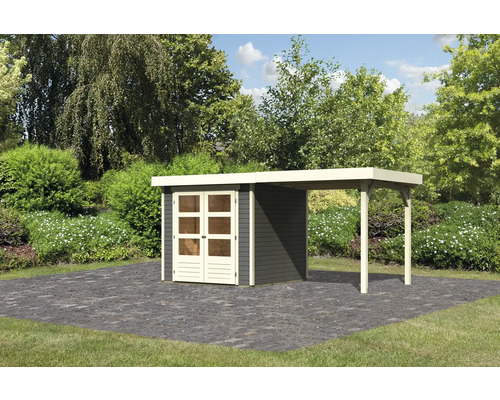 Gartenhaus mit Carport auf gepflasterter Fläche