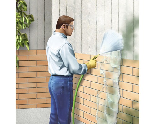 Illustration einer Person, die eine Ziegelwand mit einem Hochdruckreiniger säubert.