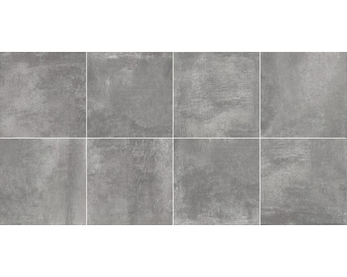 Graue Fliesen mit Zementoptik, geeignet für Wand- und Bodenbeläge.