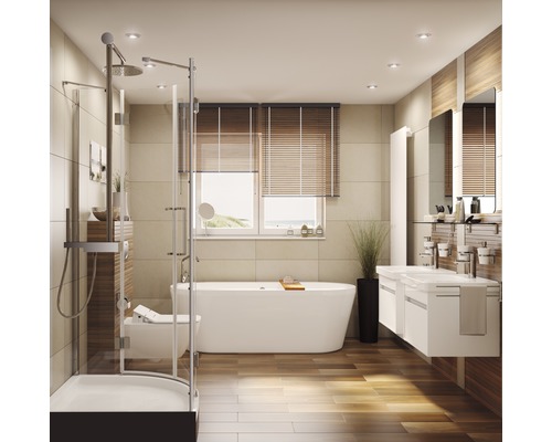 Salle de bain lumineuse avec douche, baignoire, lavabo et fenêtre.