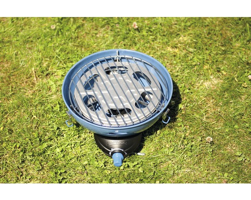Runder Campinggrill mit Grillrost auf Gras