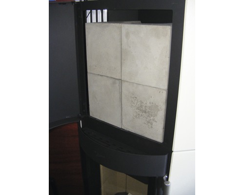 Poêle à bois avec revêtement de chambre de combustion