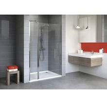 Salle de bain moderne avec cabine de douche, lavabo et carrelage gris