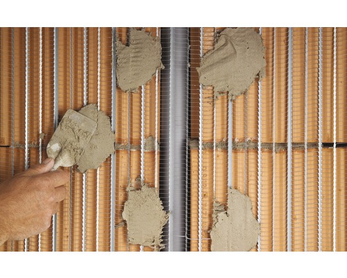 Isolation de mur extérieur avec mortier d''armature et tissu