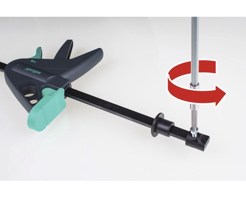 Wolfcraft Einhandzwinge mit Schraubendreher und rotem Pfeil