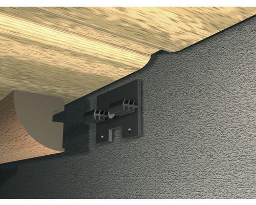 Fixation d''un profilé décoratif au mur