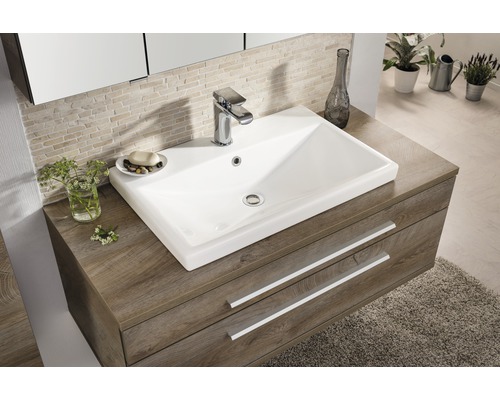 Waschtischunterschrank mit Aufsatzwaschbecken, Armatur und zwei Schubladen im modernen Badezimmer