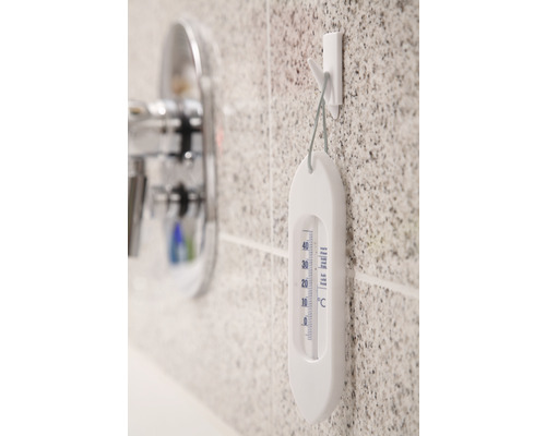 Thermomètre de bain sur le mur