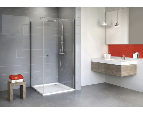 Salle de bain moderne avec cabine de douche, lavabo et miroir