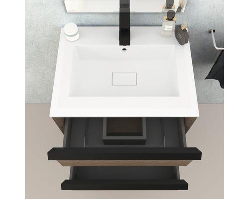 Waschtischunterschrank mit geöffneten Schubladen und Aufsatzwaschbecken