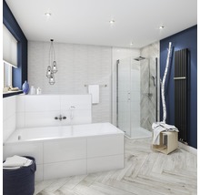 Salle de bain lumineuse avec baignoire, douche et radiateur