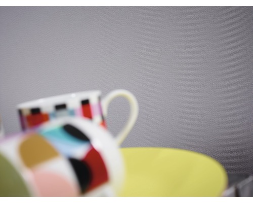 Mehrfarbige Tassen mit Untertasse