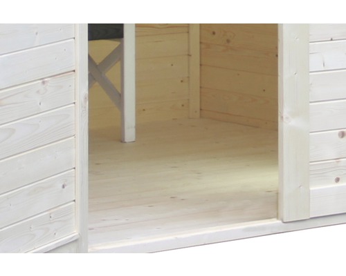 Intérieur d''une cabane de jardin en bois avec plancher et murs en bois