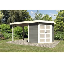 Abri de jardin avec annexe sur pelouse