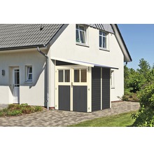 Abri de jardin en bois avec double porte et auvent contre le mur de la maison
