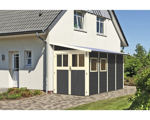 Garage en bois avec auvent sur une maison