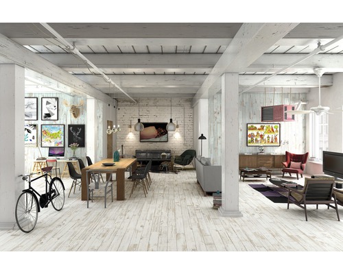 Espace de vie lumineux avec plancher en bois, table à manger, espace de travail et divers sièges