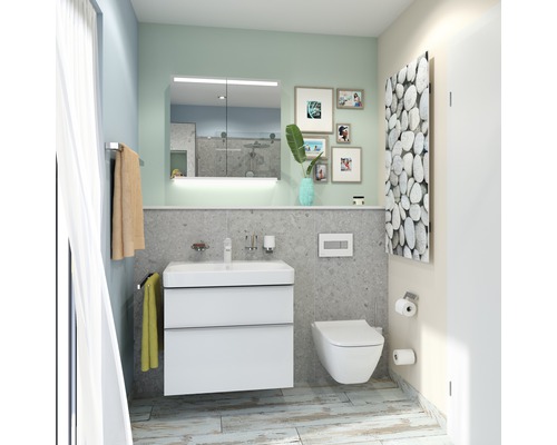 Salle de bains claire avec meuble sous-lavabo, armoire de toilette, WC et radiateur