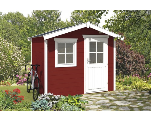 Abri de jardin en bois avec fenêtre et porte dans le jardin