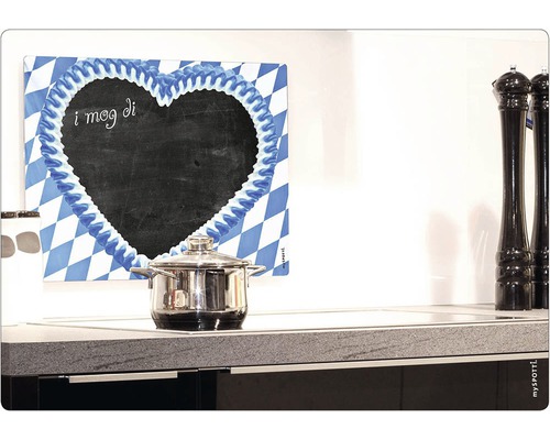 Tableau décoratif en forme de cœur avec motif losanges bavarois et casserole sur une plaque de cuisson