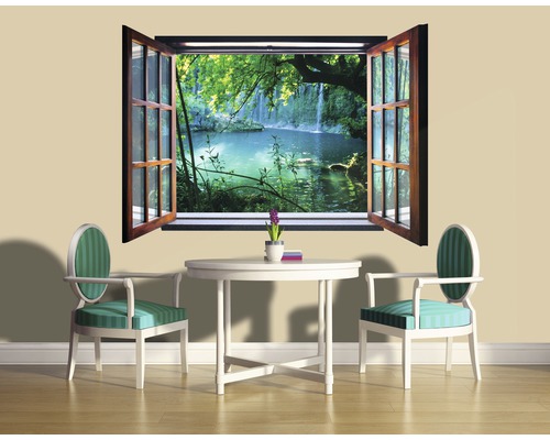 Wandaufkleber mit Fensterblick auf eine Waldlandschaft mit Wasserfall, Tisch und Stühlen