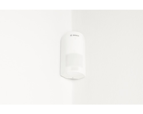 Logo Bosch. Détecteur de mouvement monté sur un coin.