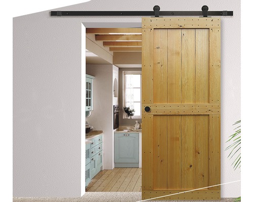 Porte coulissante en bois devant l''entrée de la cuisine avec système de porte coulissante