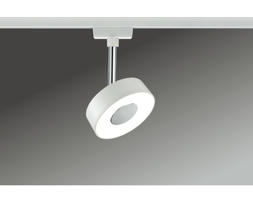 Spot sur rail LED blanc fixé sur un rail.