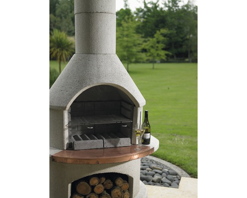 Barbecue de jardin maçonné avec grille et compartiment à bois