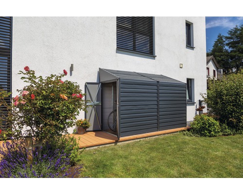 Abri de jardin en métal avec porte ouverte et vélo