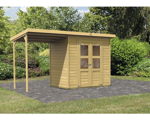 Abri de jardin avec extension en bois dans le jardin