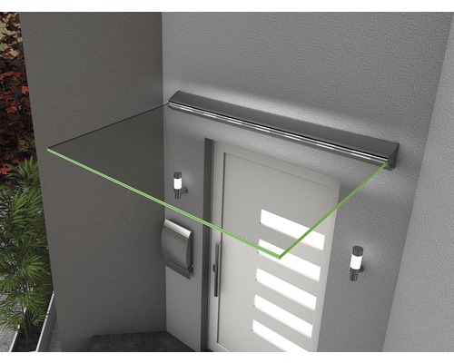 Vordach aus Glas über einer Haustür mit Briefkasten und Aussenleuchten