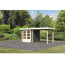Abri de jardin avec annexe sur une surface pavée sur fond vert