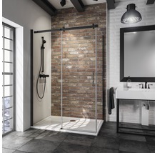 Modernes Badezimmer mit Duschkabine, Waschtisch und Backsteinwand
