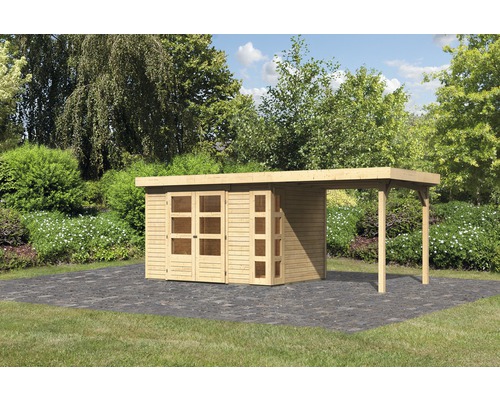 Abri de jardin en bois avec annexe dans le jardin