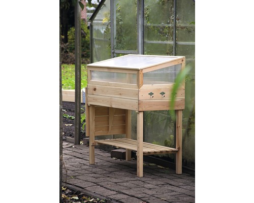 Jardinière surélevée en bois avec couvercle rabattable et espace de rangement dans le jardin