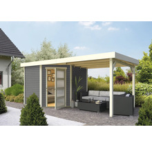 Gartenhaus mit Lounge-Bereich und Terrassenmöbeln auf gepflasterter Fläche