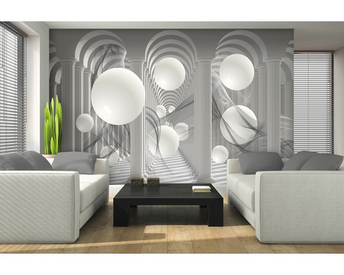 Salon avec papier peint à motif de colonnes et de sphères