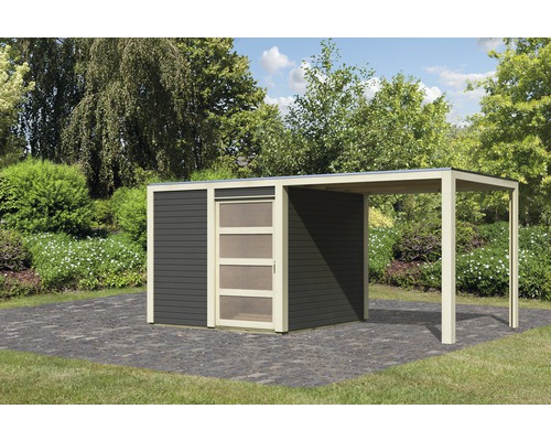 Abri de jardin avec carport intégré dans un cadre de jardin